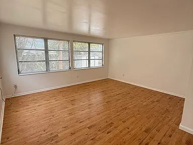 Building Photo - Charming Centrally Located Home | Wood Floors + Fenced Yard