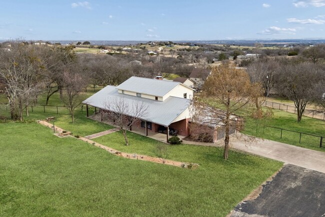 Building Photo - Stunning 4 bedroom 3.5 bath with office that sits on 1.5 acres in ALEDO ISD