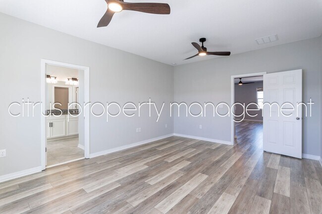 Building Photo - Stunning Double Waterfront 4/3 Home with Dock and Electric Boat Lift