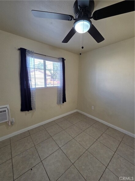 Building Photo - 7888 N Maple Ave