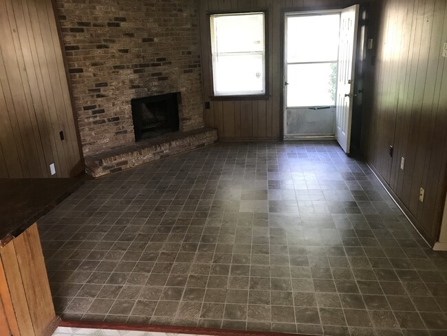 Front door of informal living room with fireplace - 5148 Queen Eleanor Ln