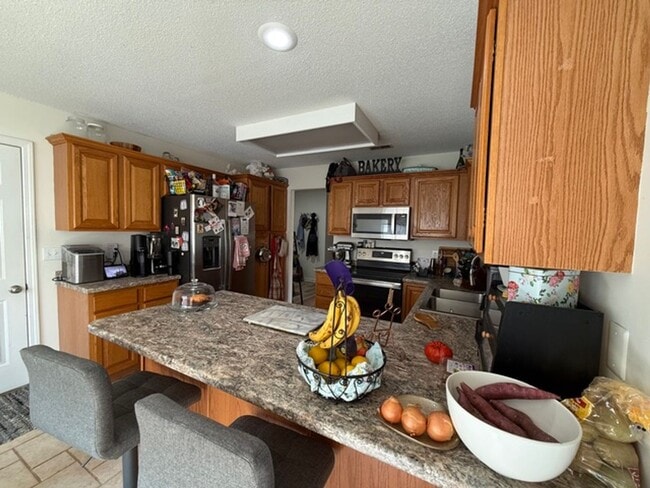 Building Photo - Spacious 4BR Home in Seven Oaks with Garage & Fenced Yard