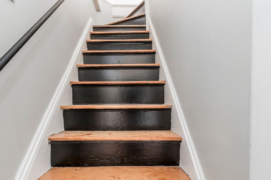 Stairs to top floor - Top floor has 2 bedrooms on it - 221 Bridge St