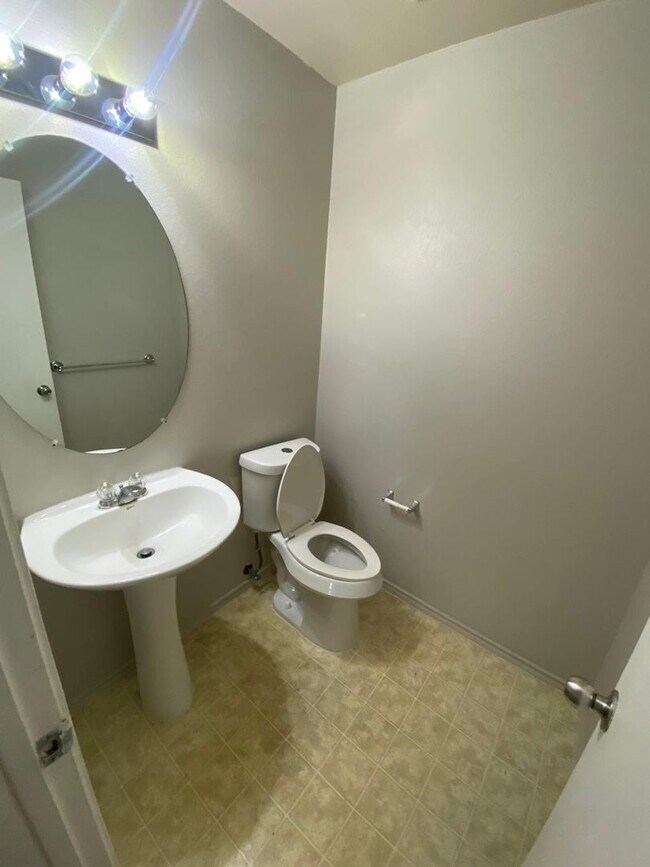 Building Photo - Formal Living and Dining on both sides of ...