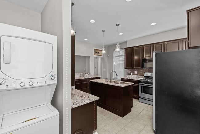 Building Photo - *MOVE IN SPECIAL* High end, 3 bedroom single family home in The Grove!