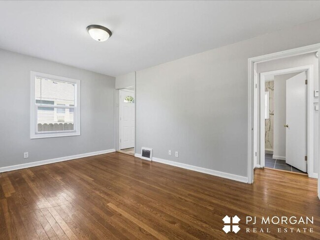 Building Photo - Stylish Updates + Spacious Yard + 2-Car Ga...