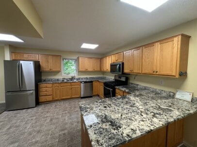 Building Photo - "Charming 5-Bed Home on Grand Ave: Spacious Living with 2.5 Baths in Heart of St. Paul!"