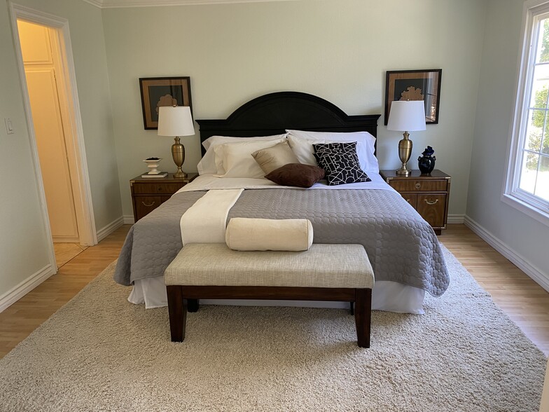 Downstairs bedroom. En suite bathroom. Furniture does not come with the unit. - 1845 Anaheim Ave