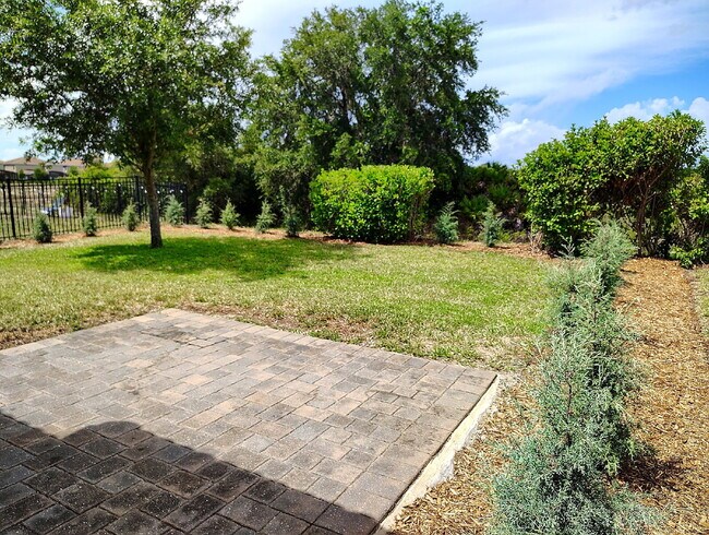 Building Photo - "Resort-Style Living in Davenport: Spacious 4-Bedroom Home with Solar Panels, Internet Included &...