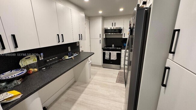 Building Photo - 5005 Collins Ave