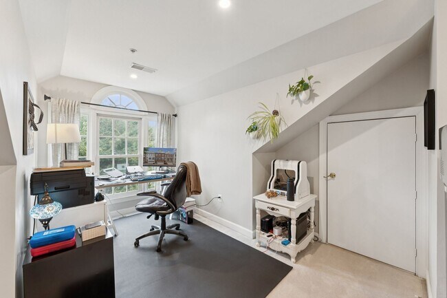 Building Photo - Discover this stunning four-level townhous...