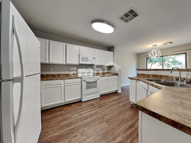 Building Photo - 11167 W Garfield St