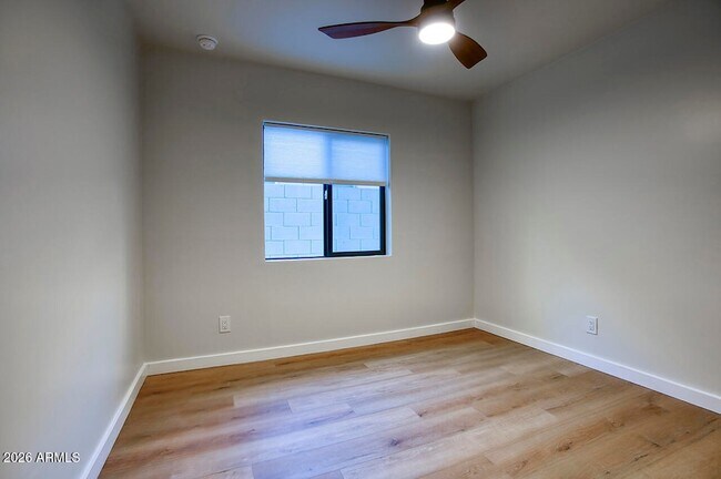 Building Photo - 8015 W Roma Ave