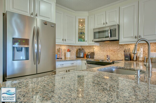 Building Photo - Villa Capriani 102B @ 790 New River Inlet Rd