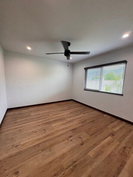 New plank flooring and hand finished base moldings - 1016 Western Ave