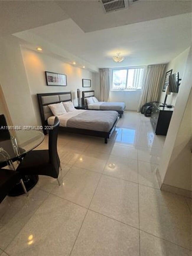 Building Photo - 19370 Collins Ave