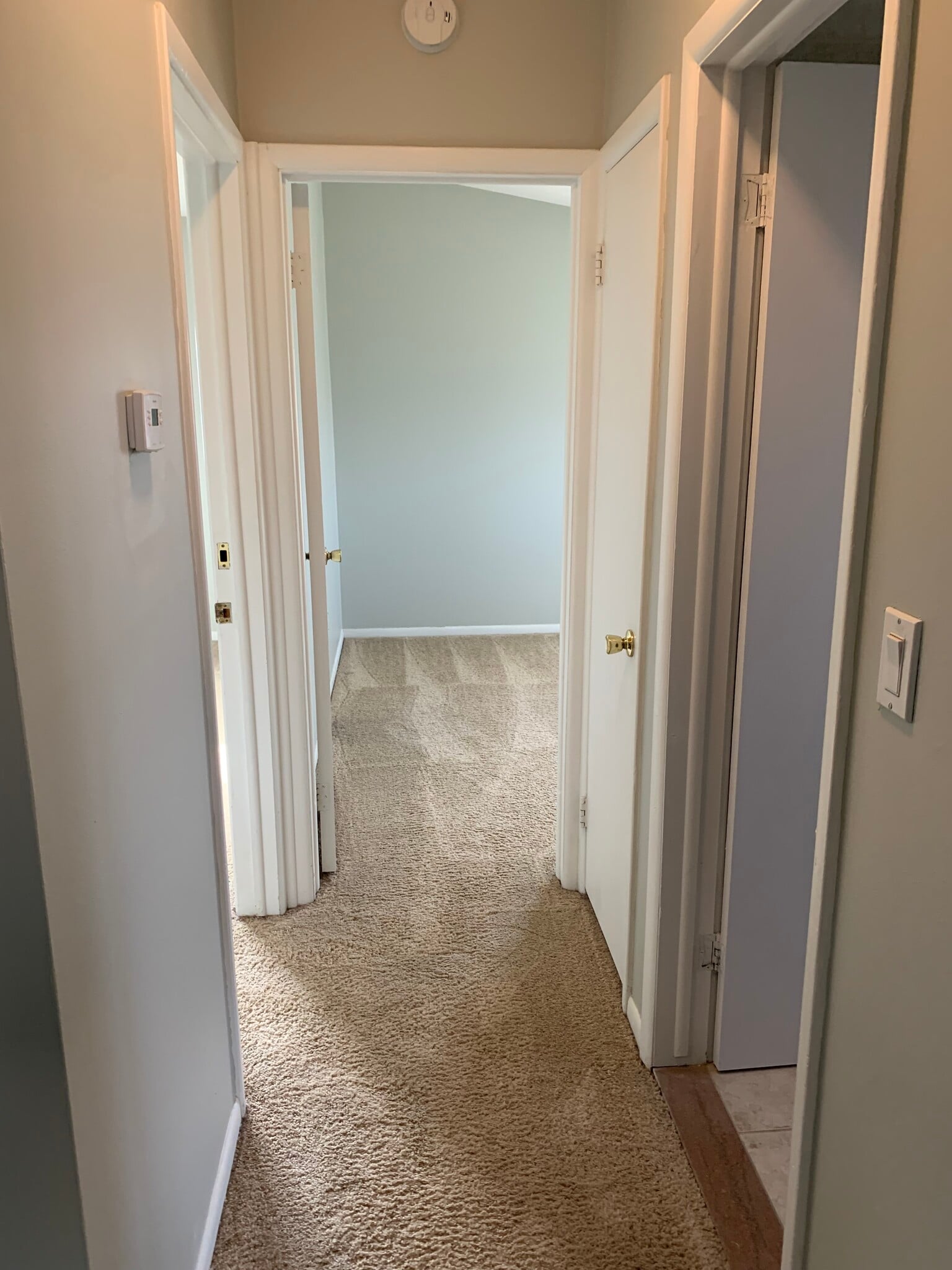 Hallway to Rooms - 880 N Adams Rd