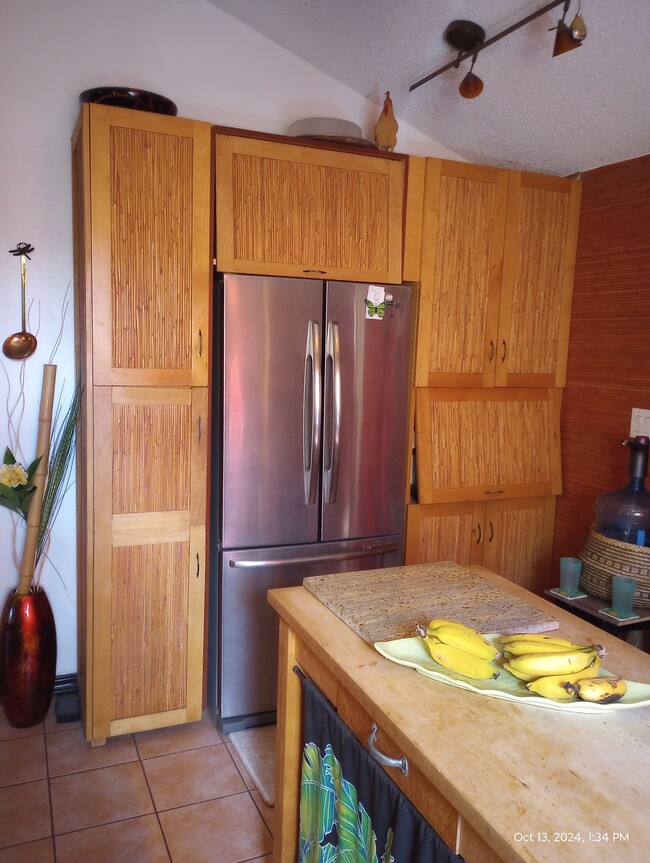 Center spacious prep island, & snacks storage below. SS Refrig, bottom freezer - 281 Kaikea St