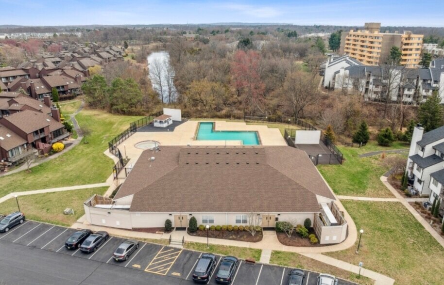 Sparkling community pool, ideal for relaxation and outdoor enjoyment. - 3320 Richmond Ct