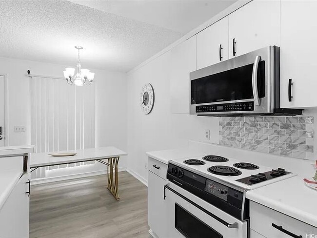 Building Photo - 94-205 Lumiaina Pl, G202