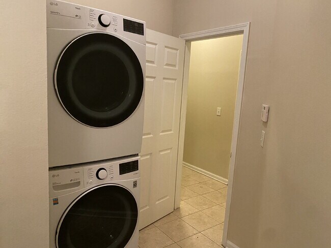 Building Photo - Beautifully Updated & Spacious 3BR/2BA Condo in a Secure Gated Community — Includes Cable, Intern...