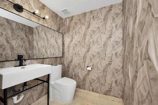 Building Photo - 9559 Collins Ave