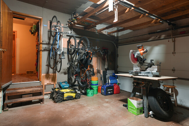 Garage. Perfect space for fabrication shop, storage, or to park your car. Has woodstove - 2507 3rd St NE