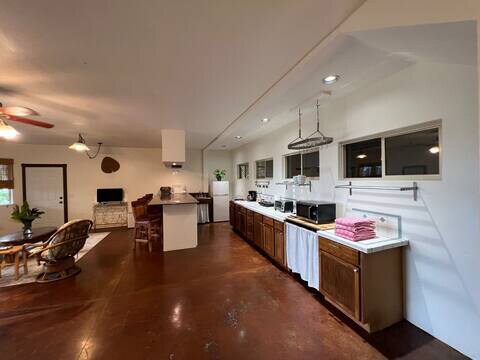 Full Kitchen with ample storage - 73-1599 Hao St