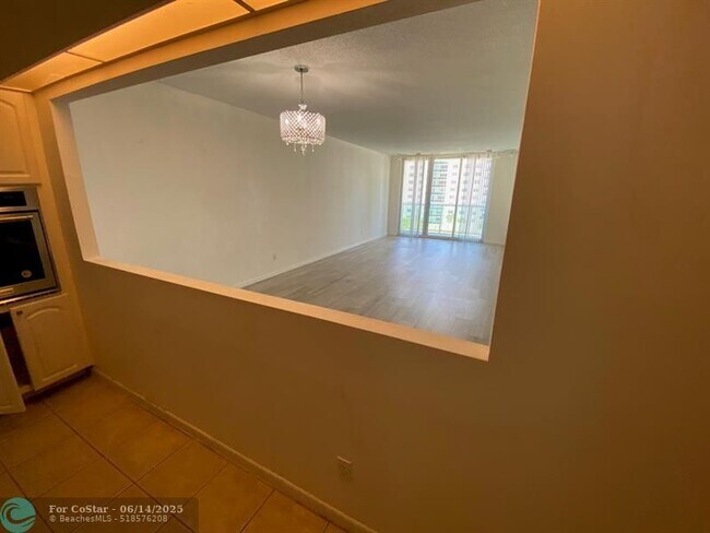 Building Photo - 19380 Collins Ave