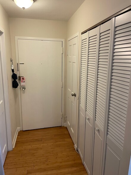 Two closets in entry foyer - 950 25th St NW