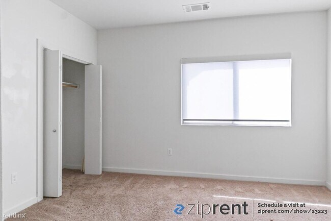 Building Photo - 2 br, 2.5 bath Townhome - 7805 Cooper Lane...