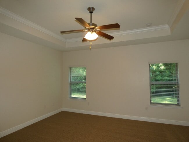 Building Photo - Spacious 5-Bedroom Home - Heart of Pace