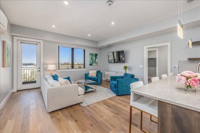 Building Photo - COME HOME TO REFINED DOWNTOWN LUXURY CONDO...