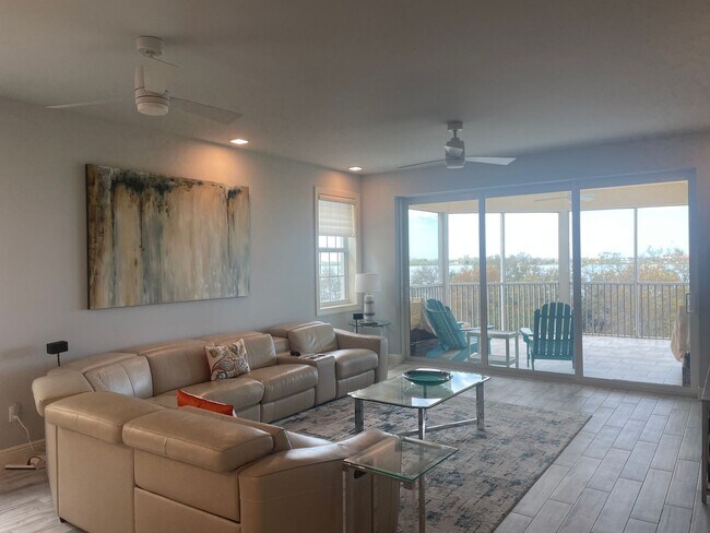 Building Photo - Coastal Luxury at Hidden Bay | 3BR Waterfront Condo with Bay Views