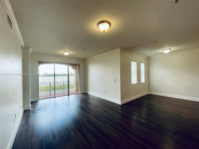 Building Photo - 6560 NW 114th Ave