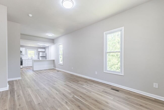 Building Photo - Remodeled 2-Bedroom Bungalow with Spacious Yard & 1-Car Basement Garage