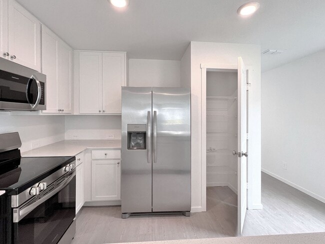 Building Photo - NEW Four-Bedroom Two-Story Home in Eagle Lake *Rent Special*