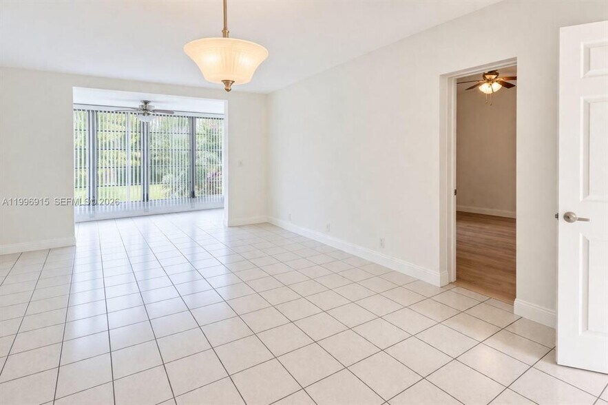 Building Photo - 5495 NW 10th Ct