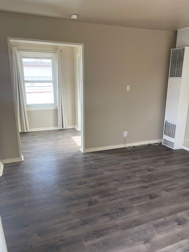 Building Photo - Coming soon! Charming 1-Bedroom Oasis with Modern Upgrades & Spacious Yard!