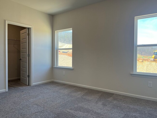 Building Photo - Beautiful Newly Constructed 3/.25 Townhome!