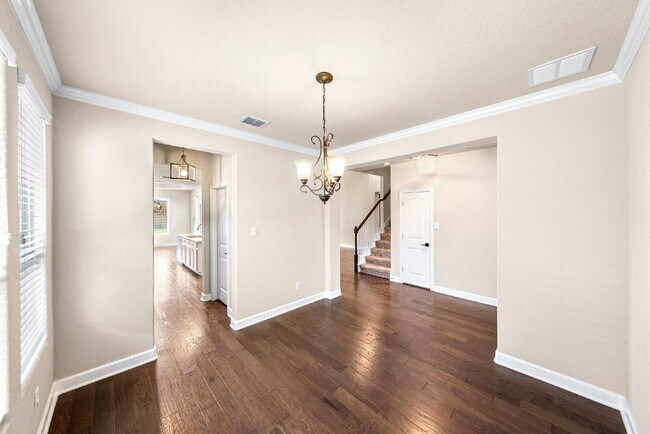 Building Photo - No Rear Neighbors, 3 Car Garage, a Chef's Kitchen, and Room for Everyone
