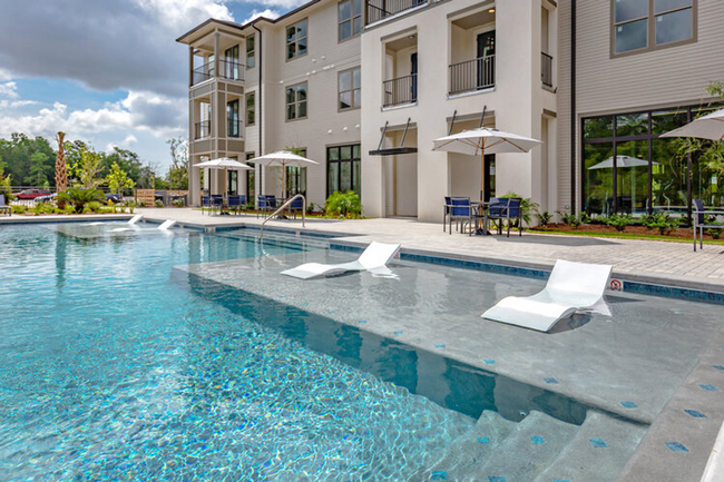 Building Photo - RARE 3 BEDROOM 2 BATH CONDO AT THE INLET -...