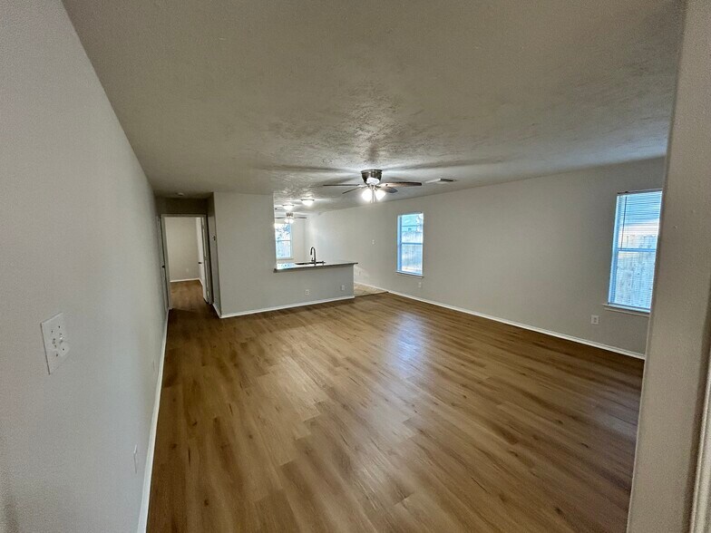 Living Room with Kitchen in Background - 16782 Fallen Timbers Dr
