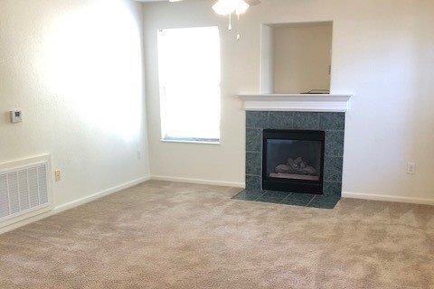 Corner Unit Living Area 2BR - Harper Square Apartments