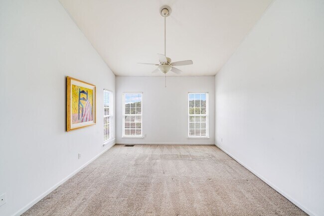 Building Photo - Enjoy Riverfront Living! Spacious 4-Bedroo...