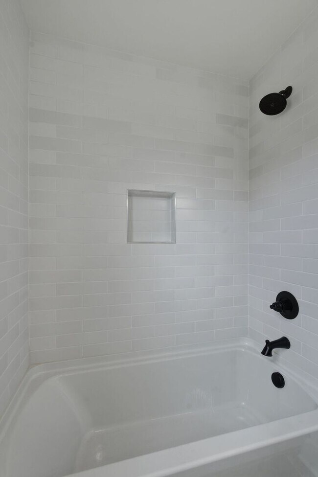 Building Photo - Spacious 5-Bedroom with Fenced Yard & Modern Amenities