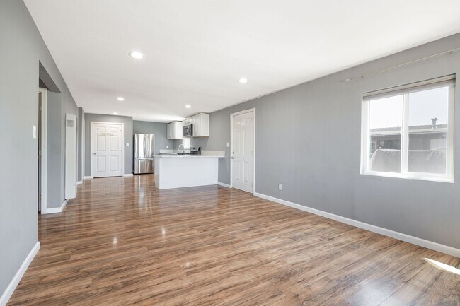 Building Photo - Spacious 3-Bedroom Upgraded Attached Home ...