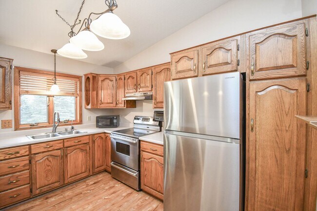 Building Photo - Spacious 4-Bedroom Acreage with Stunning Views Near Hartford — 1.5 Acres of Country Living!