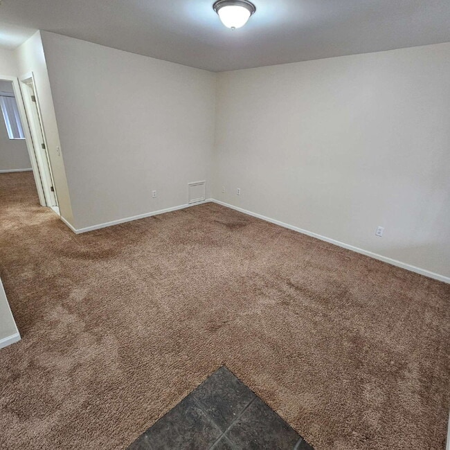 Building Photo - 1 Bedroom Condo Close to Lake St. Clair. Upper Unit with Spacious Living Room, Large Bedroom and ...