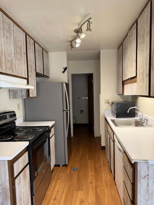 Building Photo - Spacious 2 Bed, 1.5 Bath Condo w/Carport - Outdoor Pool in Summer (Long Term Rental)